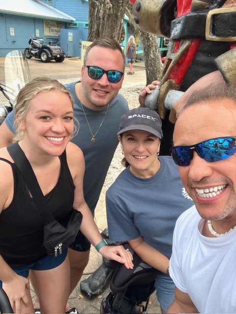 a group of people posing for the camera